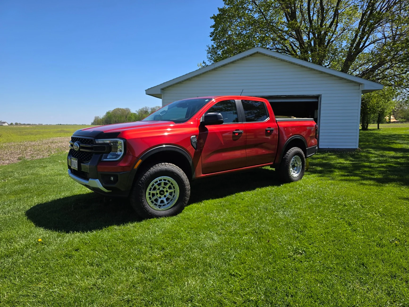 Ford Ranger Opinion on machined silver wheels on hot pepper red metallic? 20260420_114609
