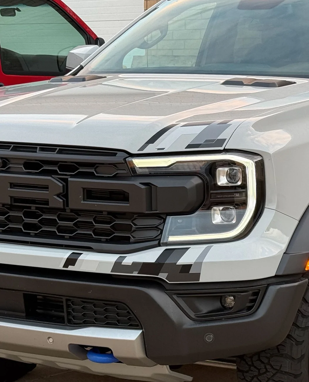 Ford Ranger Added missing decal on front bumper closer