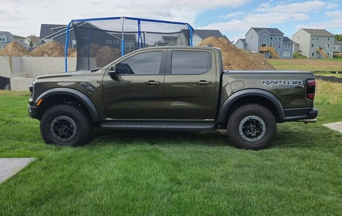 Leveled, tuned, 315/70R17s, Ford outline on grille (2024 Ranger Raptor)