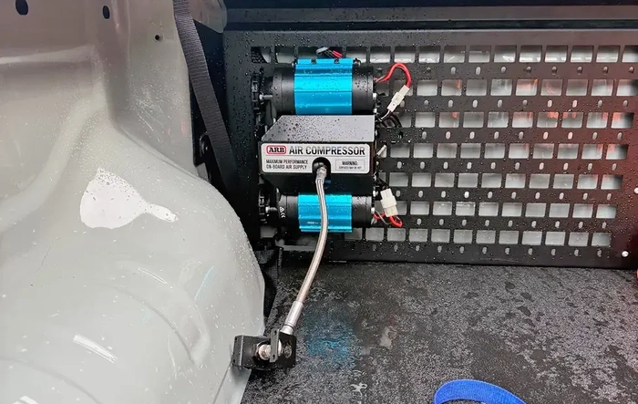 ARB On Board Air Compressor Install in bed w/ molle panel