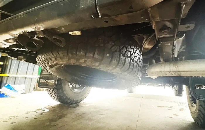 33" tire on spare wheel in factory location