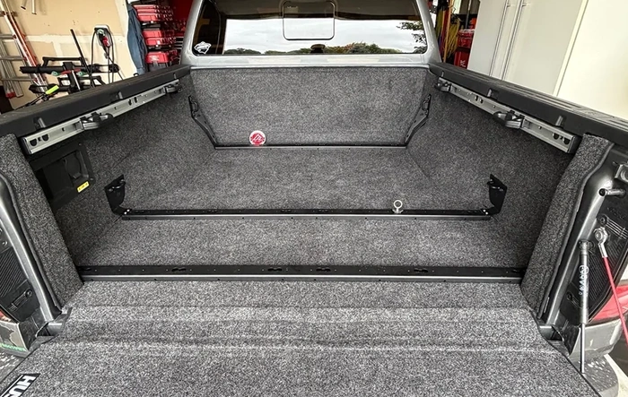 American Adventure Lab Bed Attachment System BASE rails installed