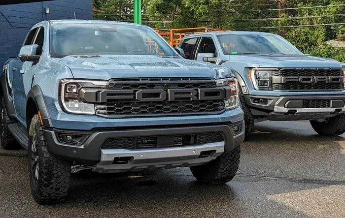 Azure Gray Metallic Ranger Raptor vs. F-150 Raptor comparison photos